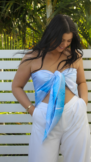 Bright scarf top styled for Hawaiian holidays, versatile for poolside to dinner looks