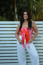 Bright scarf top with 24 styling options, inclusive fit for various body shapes and bust sizes.