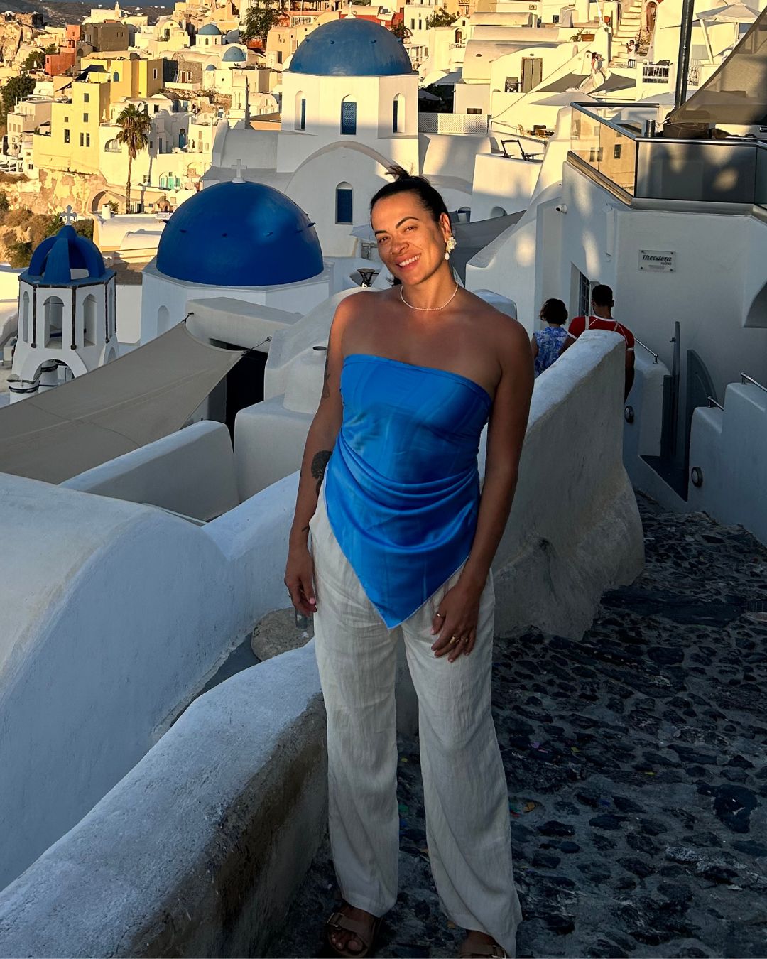 Blue Hour Scarf Top styled in Europe – multi-way, suitcase-ready resortwear top for holiday photos and travel adventures