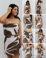 Woman wearing a brown and white patterned dress with multiple views of the same dress styled differently for vacation