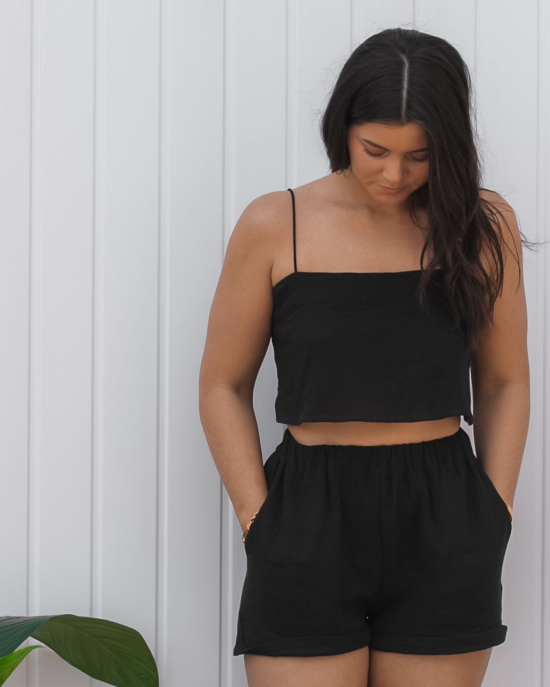 Breathable black cotton summer shorts designed for comfortable resortwear and mix-and-match travel wardrobes.