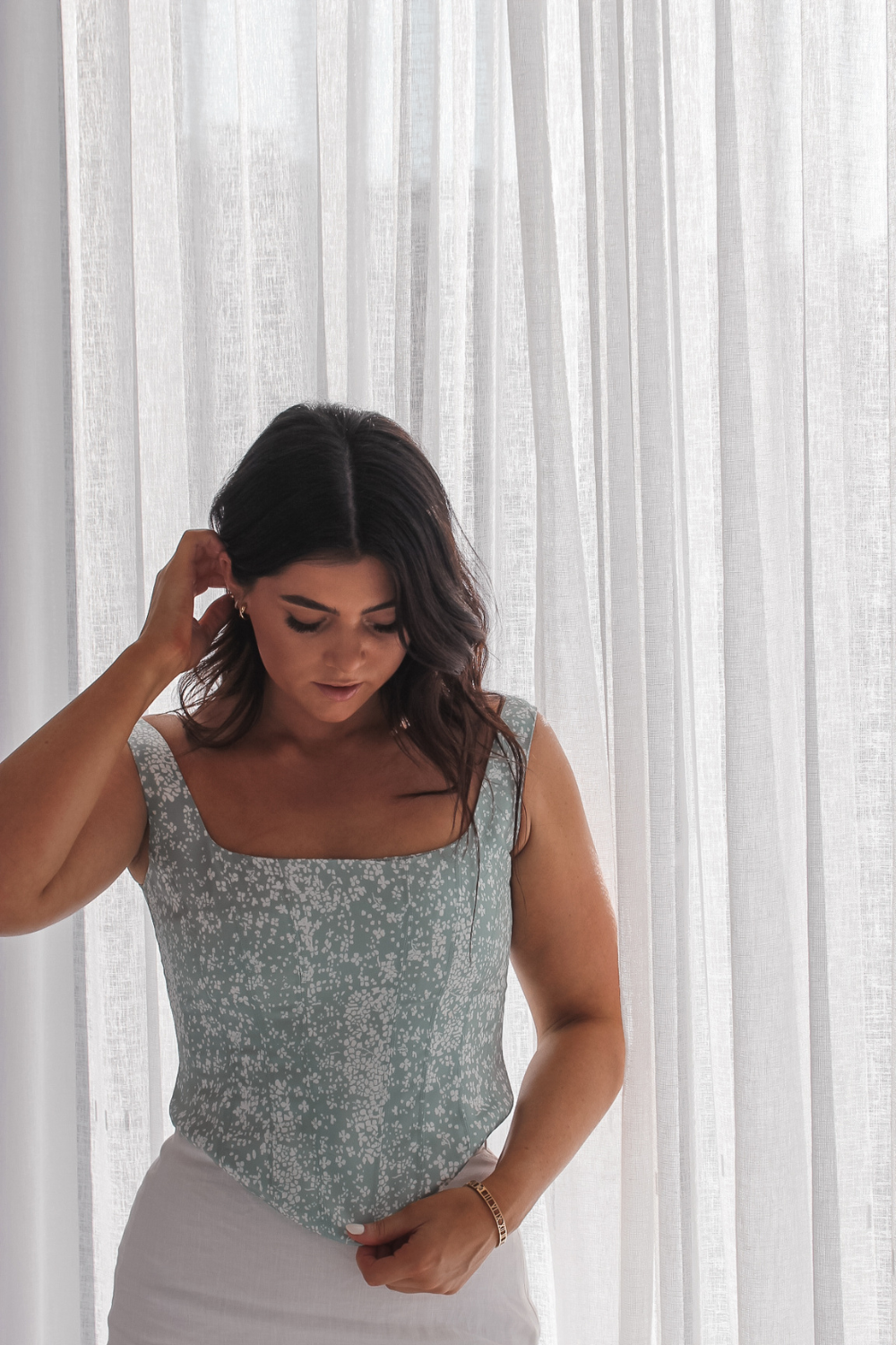 Ashlee Corset – A feminine and travel-friendly corset top that hugs the body beautifully, designed for minimal packing and maximum style