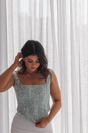 Ashlee Corset – A feminine and travel-friendly corset top that hugs the body beautifully, designed for minimal packing and maximum style
