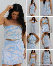 Isla scarf sarong top in a resortwear flat lay, a lightweight and packable travel top by Vaycaze.