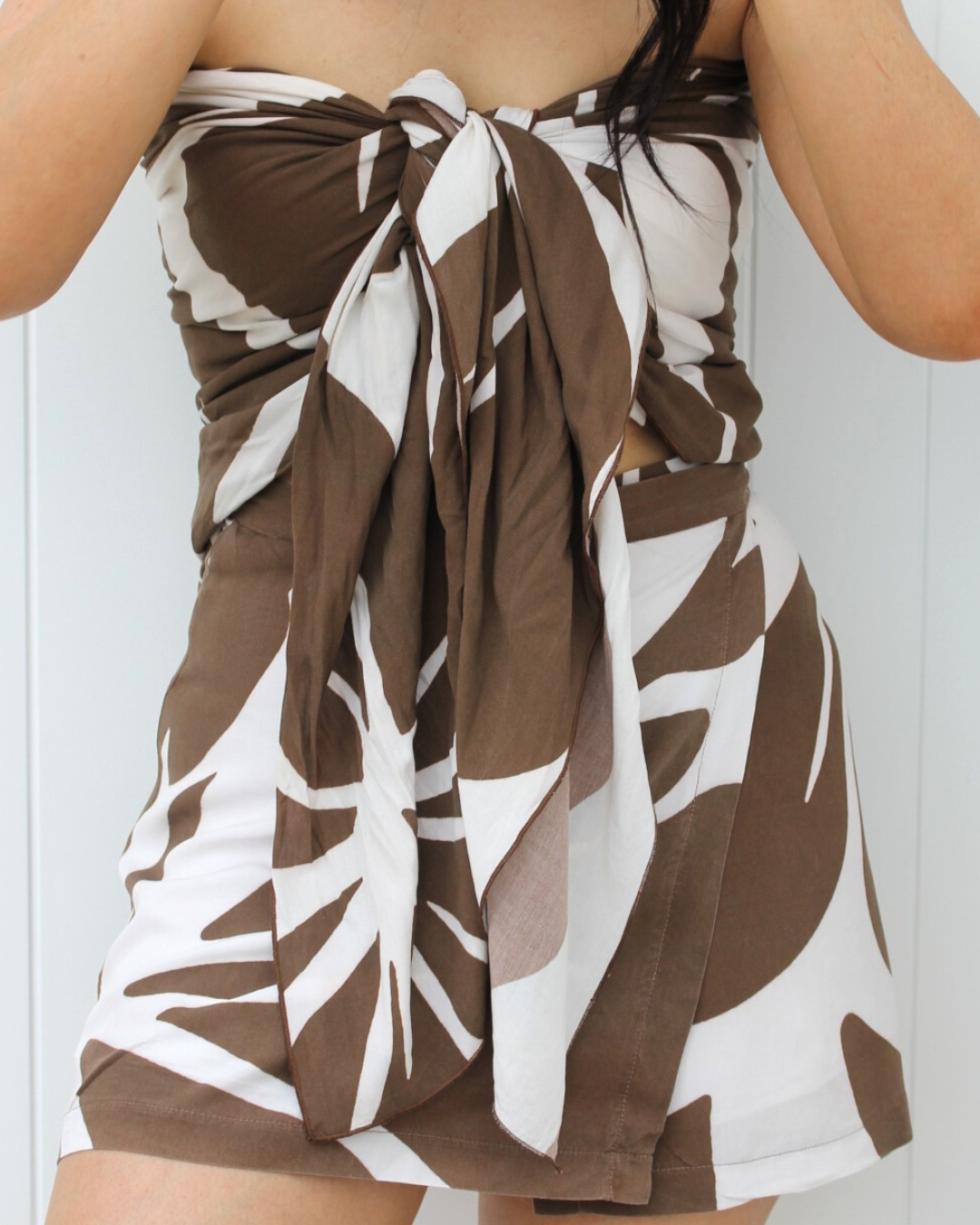 Kaia scarf sarong styled as a vacation outfit, perfect for resortwear, beach days, and summer travel.