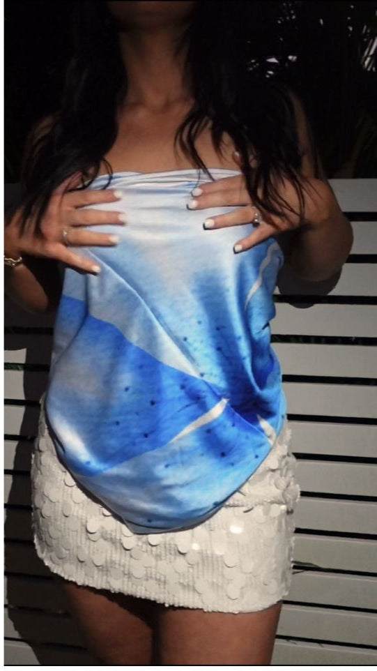 Whitehaven multiway scarf top styled as a beach sarong, versatile travel outfit