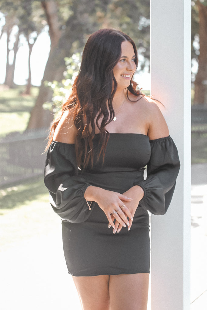 The perfect black dress for your next getaway! The Gimme Gimme Dress transitions from sunset cocktails to city strolls, offering a suitcase-friendly, stylish option for travel lovers