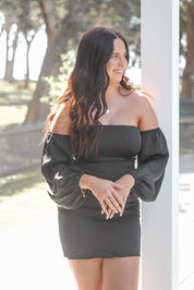 The perfect black dress for your next getaway! The Gimme Gimme Dress transitions from sunset cocktails to city strolls, offering a suitcase-friendly, stylish option for travel lovers